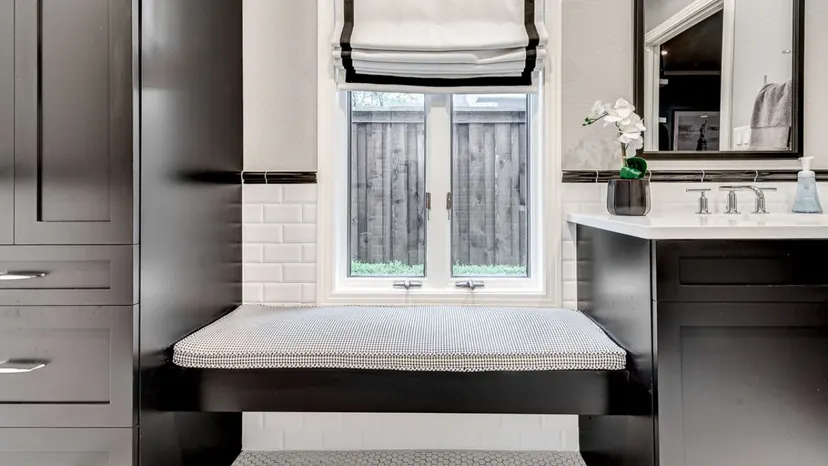 Plano bathroom remodel idea: guest bathroom with black cabinets, a window bench and subway tile